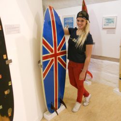 Surf champ scoops prize as museum’s 2,000th visitor